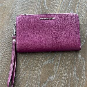 Michael Kors Pebbled Leather Wristlet in Magenta Pink